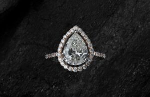 Pear Diamond Halo Engagement Ring with Matching Wedding Band