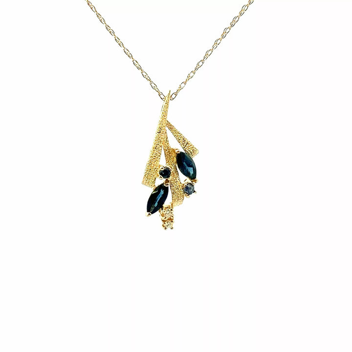 Exquisite 14 Karat Yellow Gold Pendant with Sparkling Diamonds and Rich Sapphire | Fine Estate Diamond Jewelry