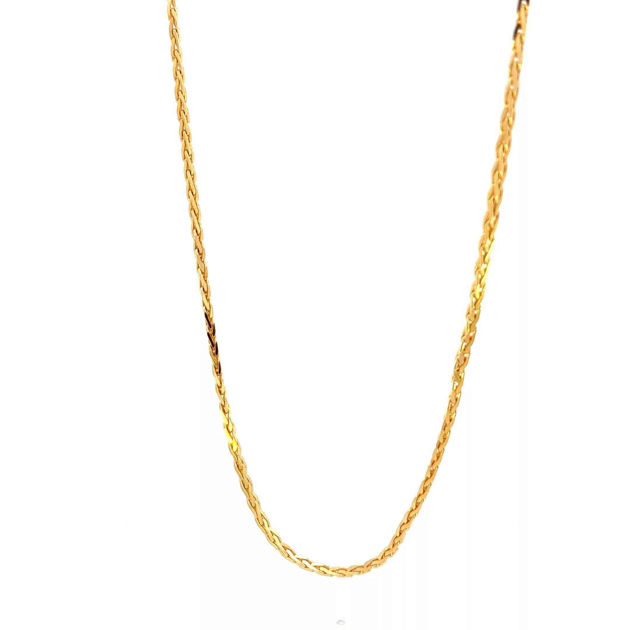 A gold chain on a white background.