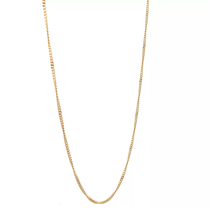 A gold chain necklace on a white background.