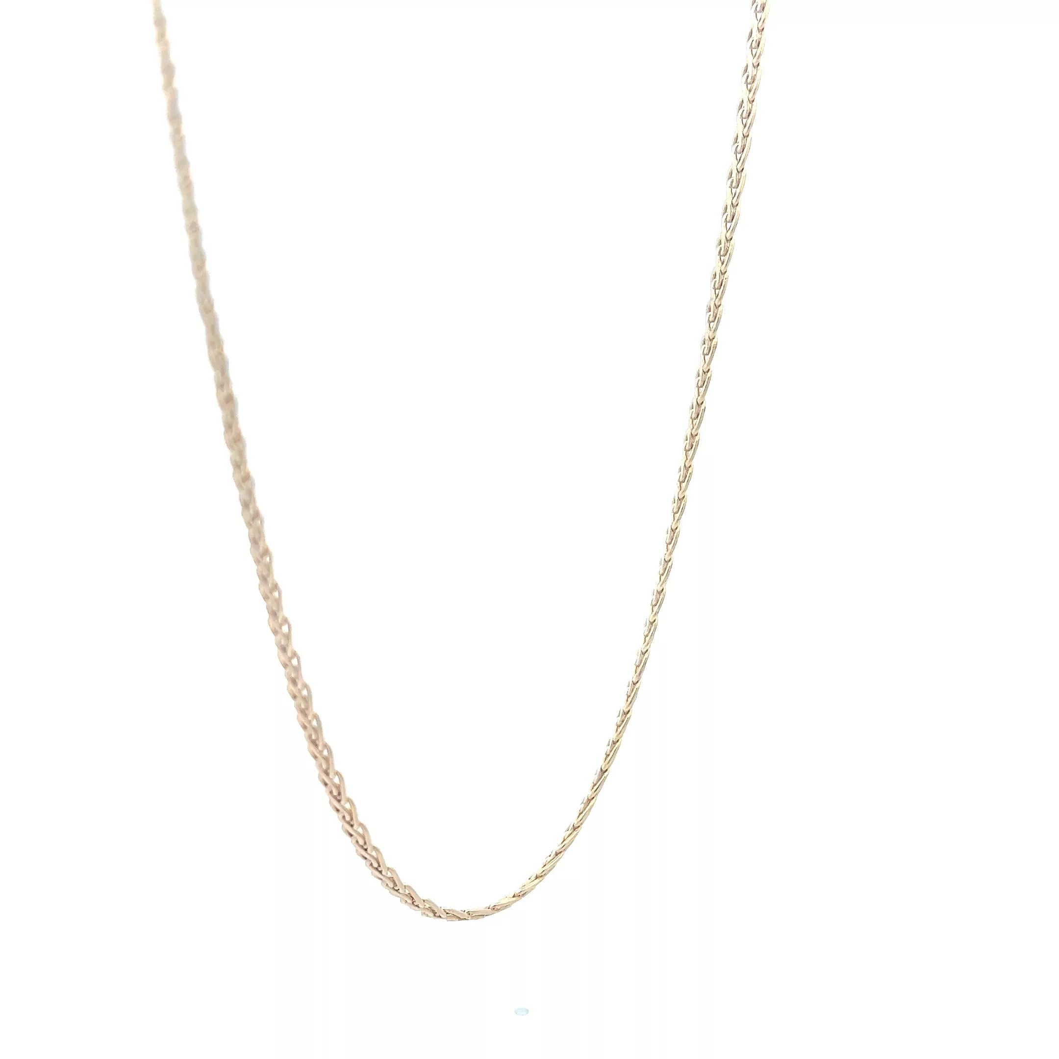 A gold chain necklace on a white background.