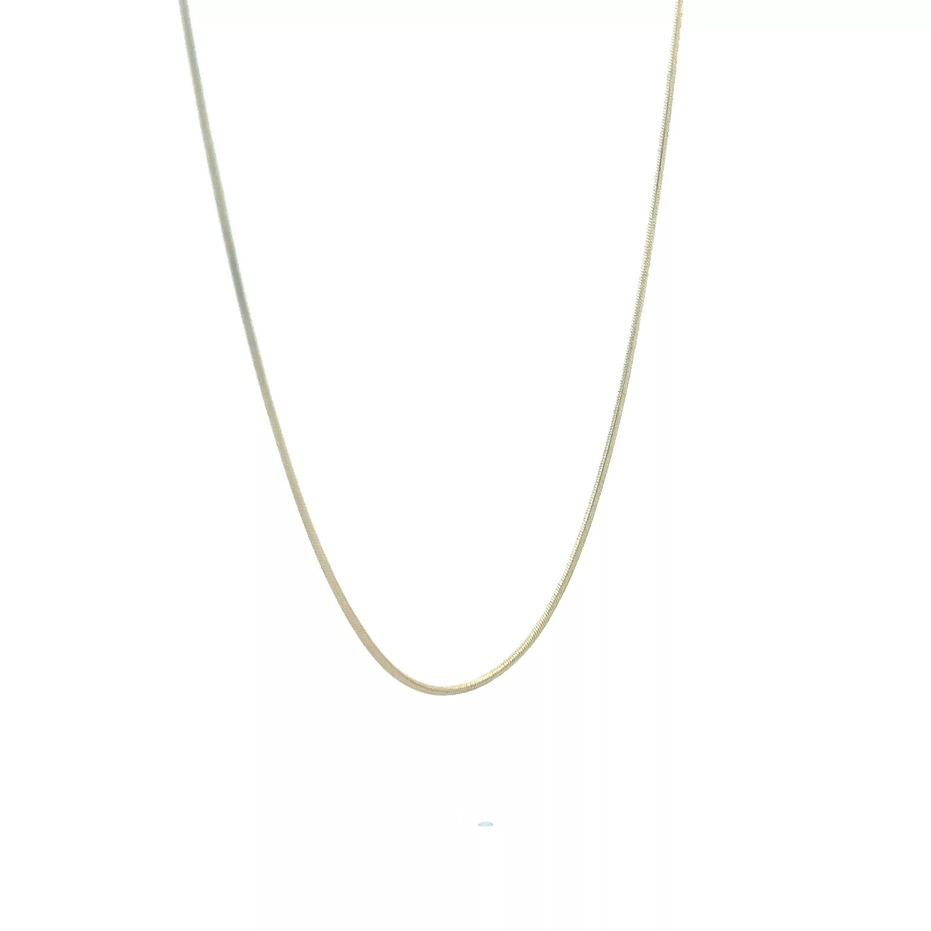 A gold chain necklace on a white background.