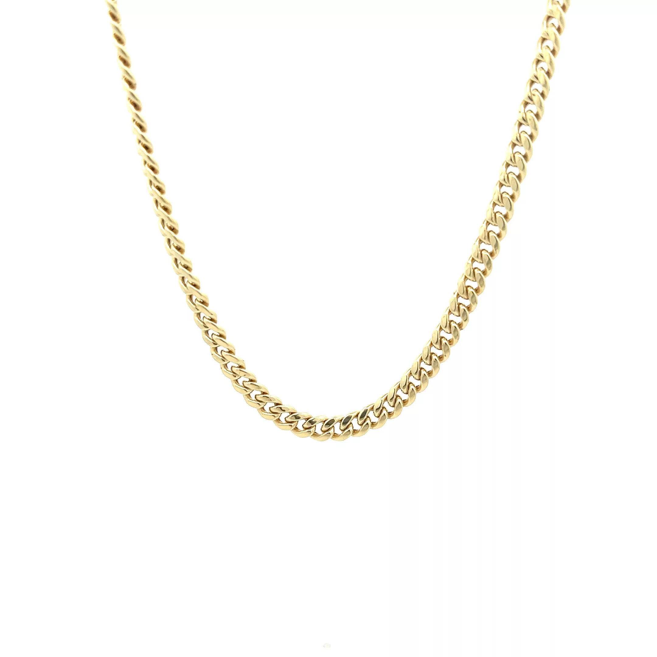 A 14 Karat Yellow Gold Cross Pendant necklace with a gold plated clasp.