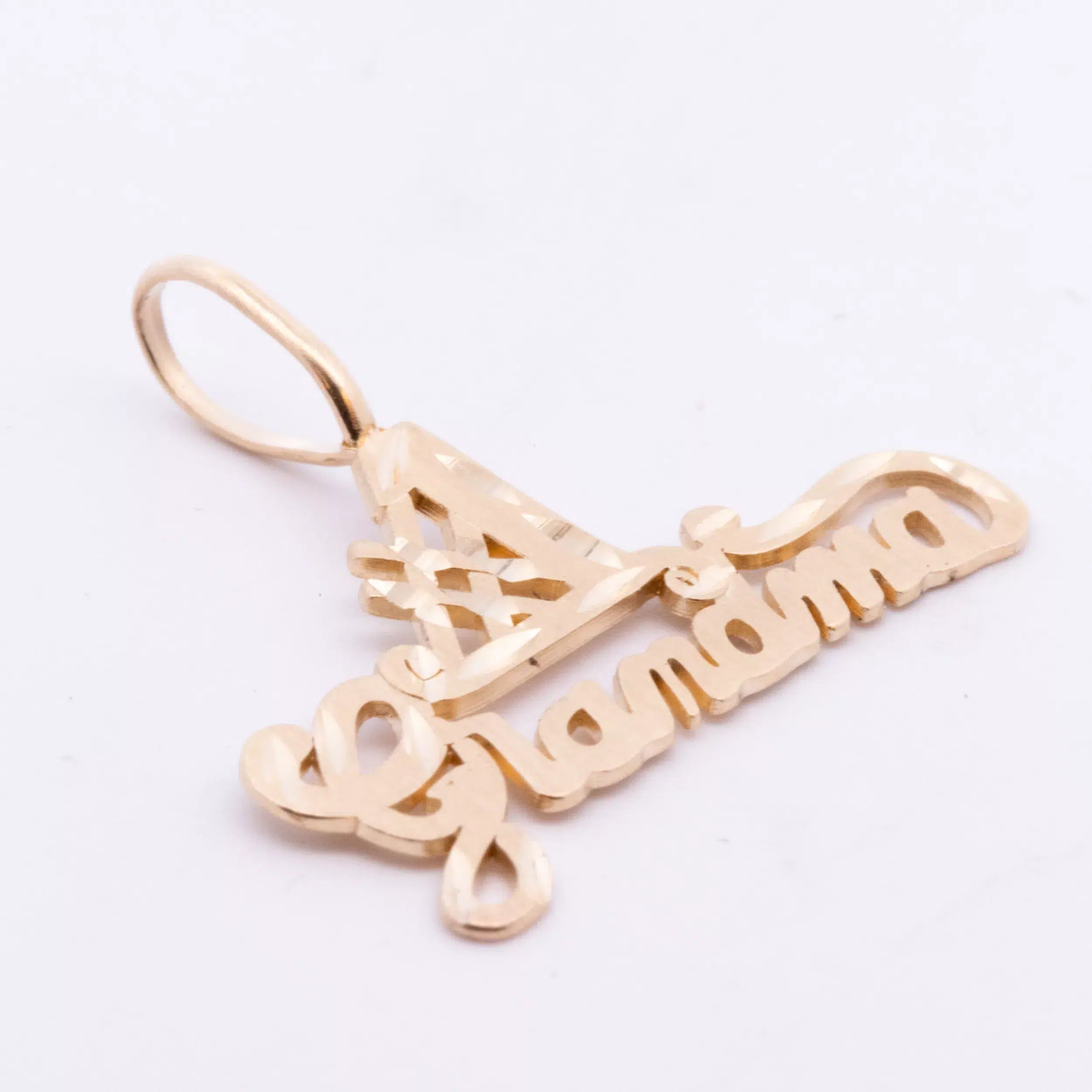 A 14 Karat yellow gold name pendant with the word grandma on a 14 Karat Yellow Gold Fashion Chain.