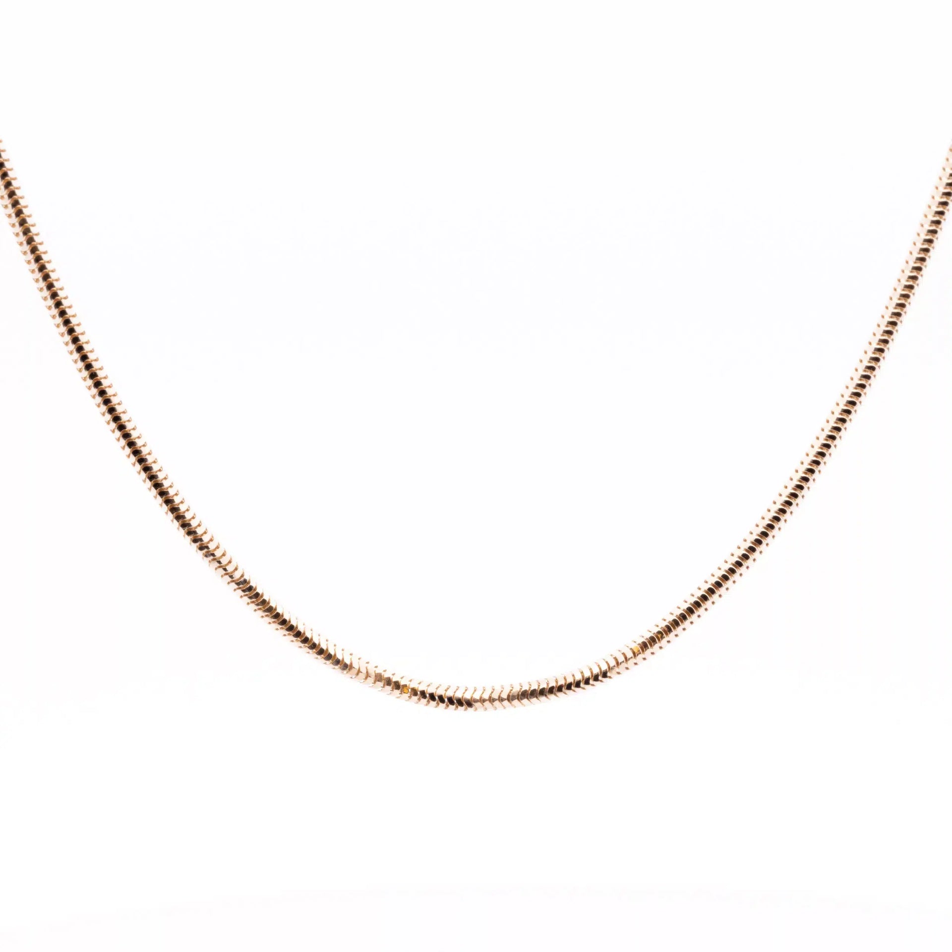 A 14 Karat Yellow Gold Fashion Chain on a white background.