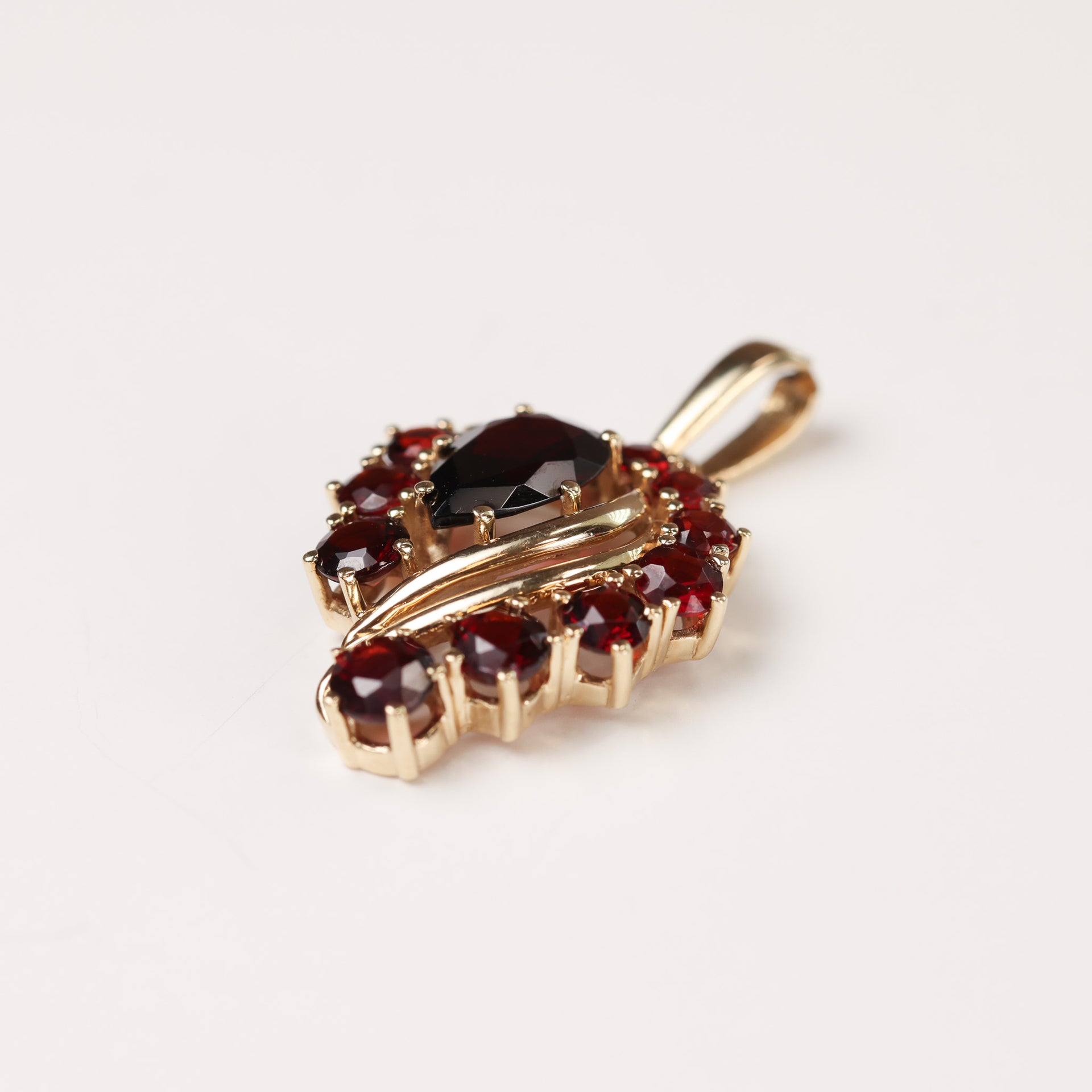 14 Karat Yellow Gold Garnet Heart Pendant