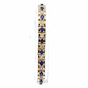 Exquisite 14 Karat Yellow Gold Link Bracelet adorned with Sparkling Diamonds and Sapphires in Blue and White | Perfect Diamond Jewelry for a touch of Elegance | Enhance your Fine Jewelry Collection with this Estate Jewelry