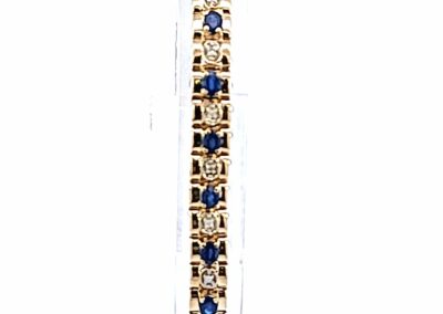 Exquisite 14 Karat Yellow Gold Link Bracelet adorned with Sparkling Diamonds and Sapphires in Blue and White | Perfect Diamond Jewelry for a touch of Elegance | Enhance your Fine Jewelry Collection with this Estate Jewelry