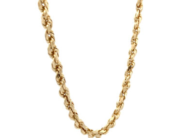 A gold plated chain with a diamond in the middle.