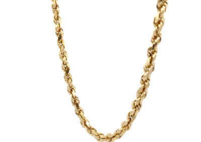 A gold plated rope chain on a white background.