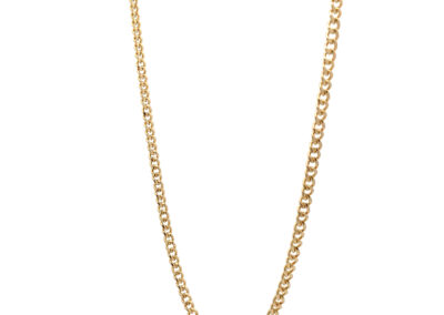 A gold curb chain on a white background.