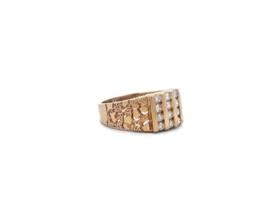 A gold ring with pearls and diamonds.