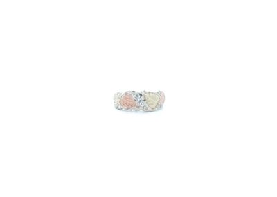 A pink and white diamond ring on a white background.