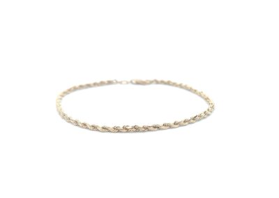 A gold chain bracelet on a white background.
