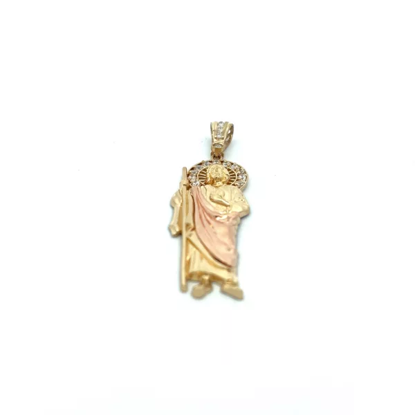 A pendant with an image of jesus on it.