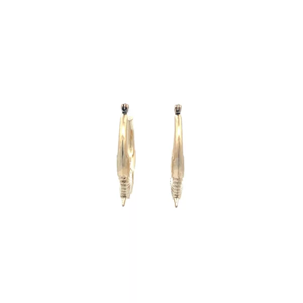 A pair of gold hoop earrings with black stones.