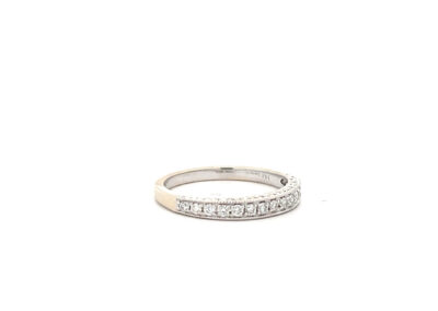 A white gold diamond ring with two rows of diamonds