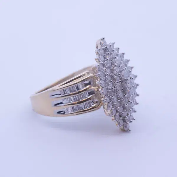 A yellow gold ring with a cluster of diamonds, made from 14 Karat Yellow Gold White Stone Tennis Bracelet.
