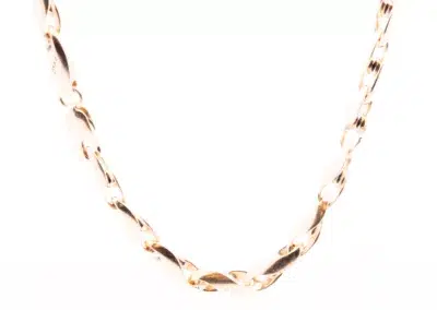 A 14 Karat Yellow Gold Fashion Chain on a white background, featuring a fashionable design.