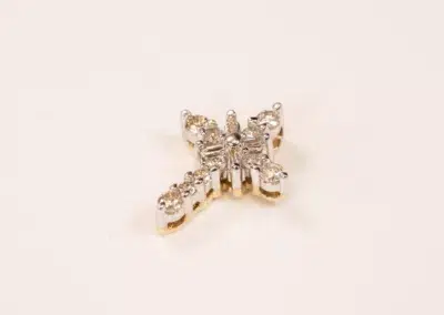 14K YG Tanzanite & Diamond Pendant snowflake-shaped ring with multiple diamond accents