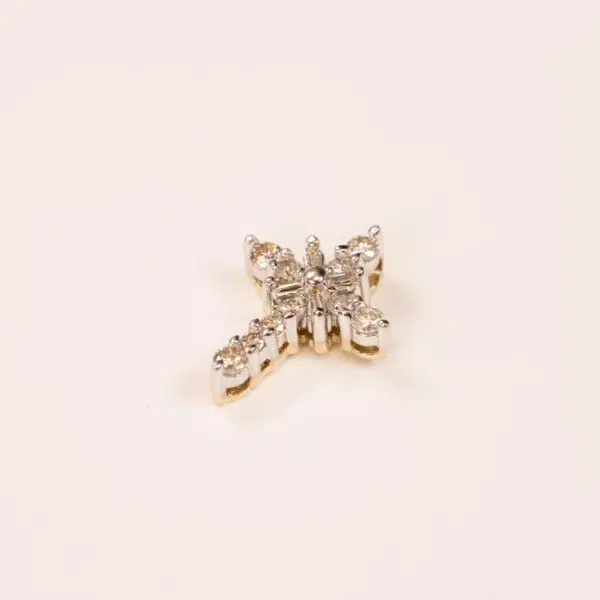 14K YG Tanzanite & Diamond Pendant snowflake-shaped ring with multiple diamond accents