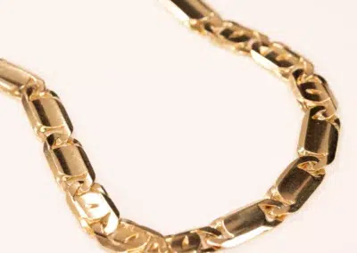 14K YG Tanzanite & Diamond Pendant necklace on a white background.