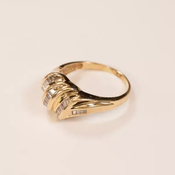 14K YG Diamonds & Peach Tourmaline Ring with vertical ribbed design and small inset diamonds, on a plain white background.